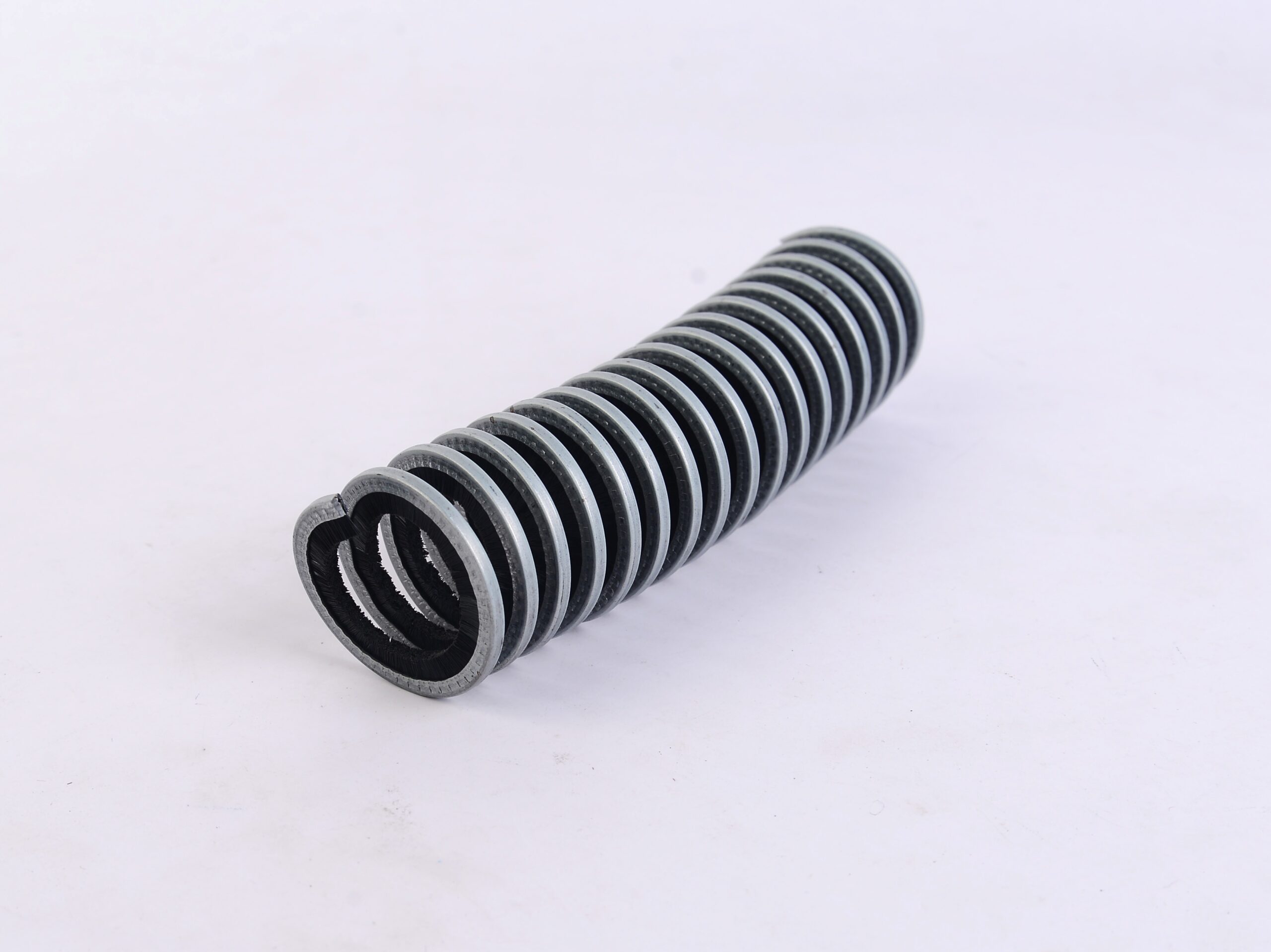 Custom product sample combining molded plastic geometry with flocked filaments.