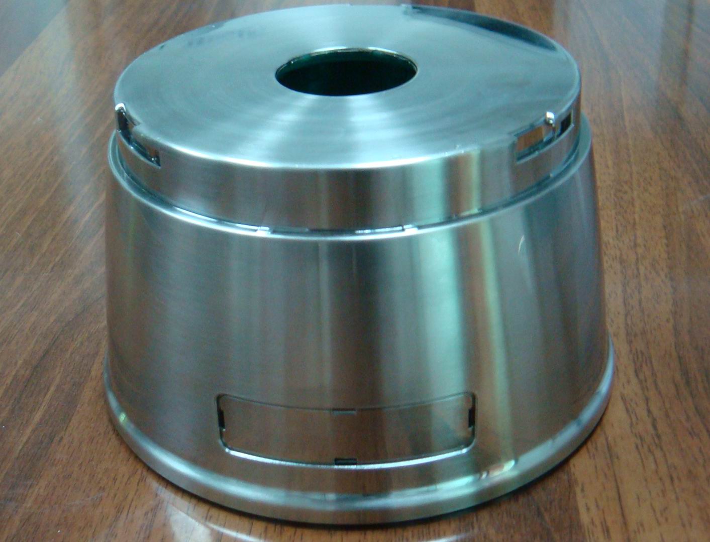 Plated plastic part with a finished decorative surface